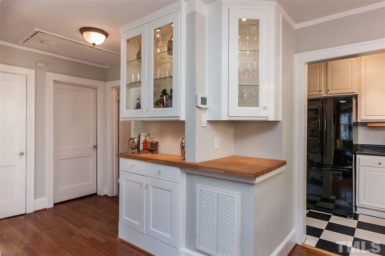 1507 Hanover Street Raleigh, NC 27608 - Photo 8 of 16 Check out the custom cabinets that were added to give the home some flare and extra storage.