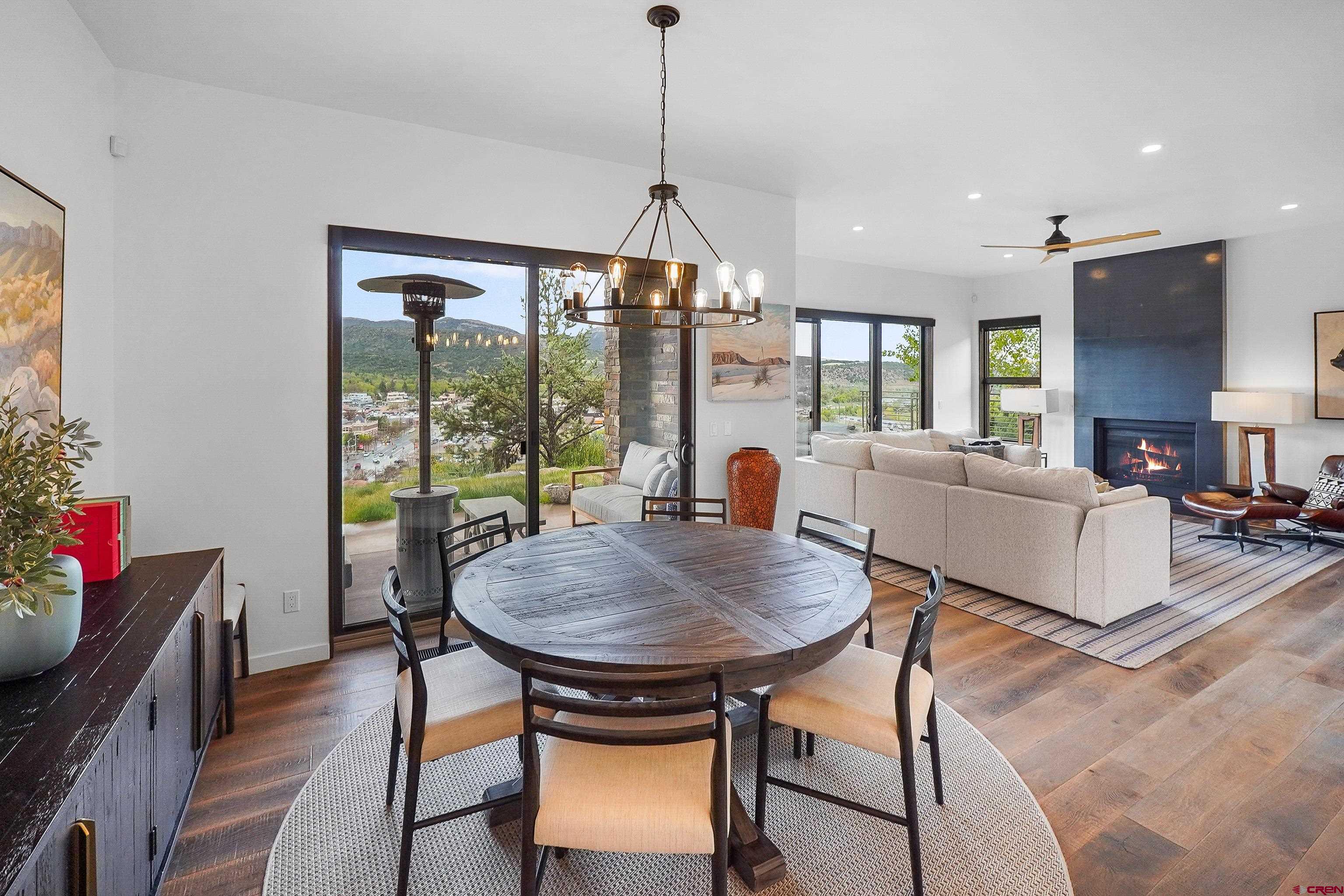 239 Rock Point Drive, Unit B Durango, CO 81301 - Photo 20 of 45 a view of a dining room with furniture window and outside view