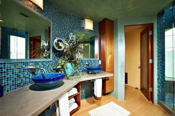 a bathroom with a bathtub and a shower