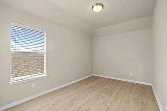 an empty room with a window