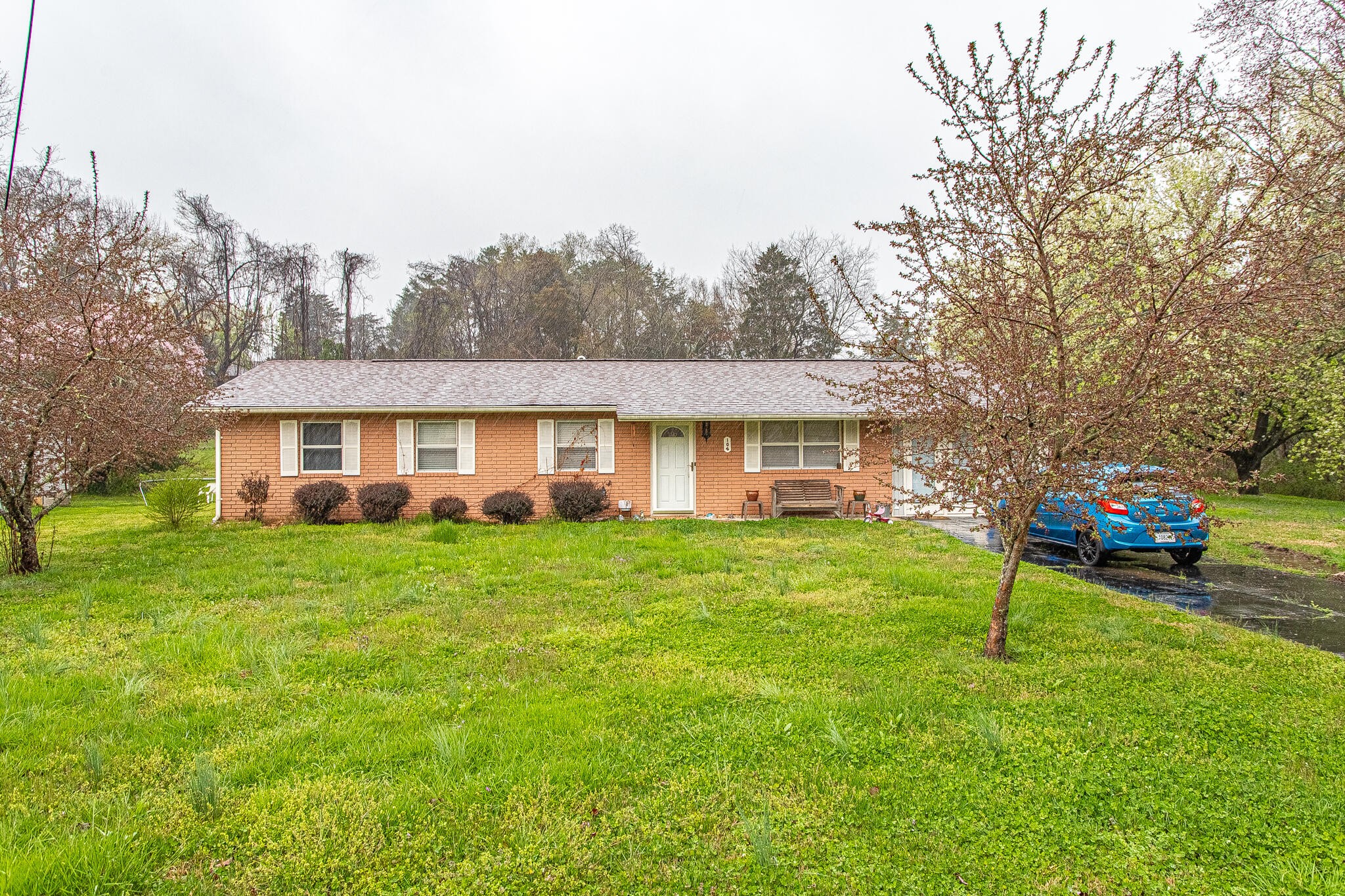 104 West Lincoln Road Oak Ridge, TN 37830 - Photo 1 of 30 a view of a house with a yard and sitting area