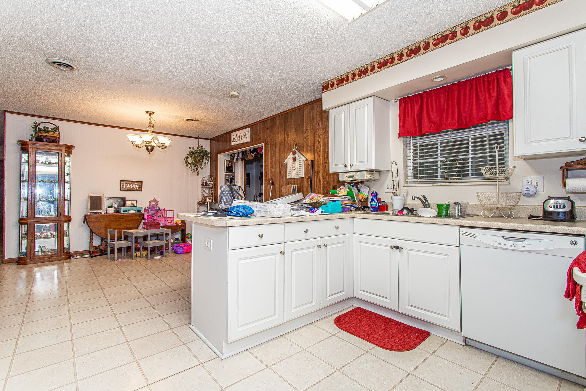 104 West Lincoln Road Oak Ridge, TN 37830 - Photo 7 of 30 a kitchen with a white cabinets and white appliances