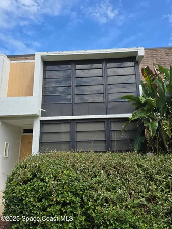 a view of outdoor space with wooden fence