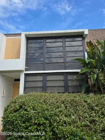 a view of outdoor space with wooden fence