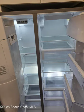 a view of swimming pool with outdoor seating