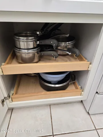 a view of a backyard with sitting area