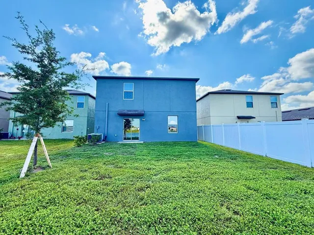an aerial view of a balcony with a swimming pool