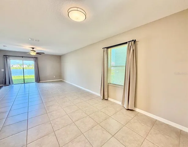 an empty room with windows