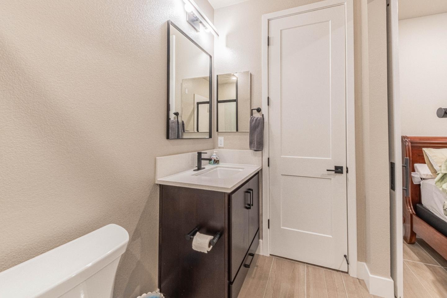 135 8th Street Marina, CA 93933 - Photo 19 of 69 a bathroom with a sink toilet and shower