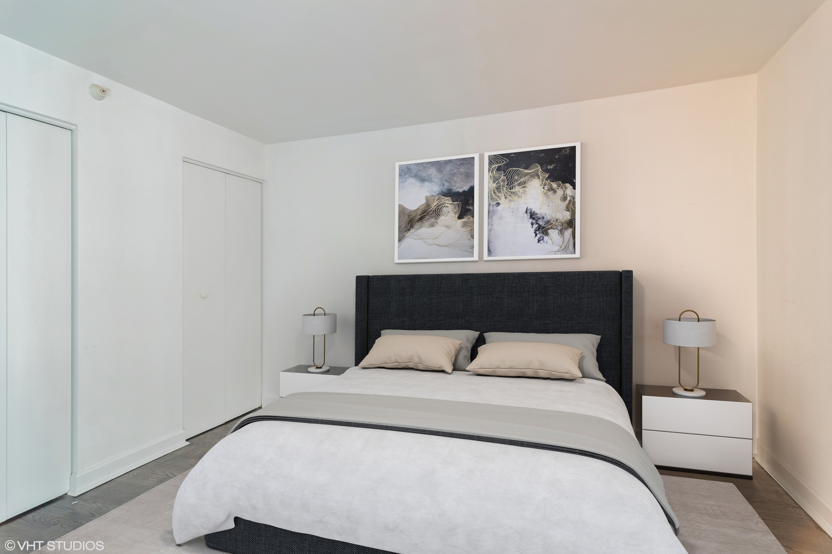 545 North Dearborn Street, Unit 1506 Chicago, IL 60654 - Photo 8 of 15 a bedroom with a bed and wall painting