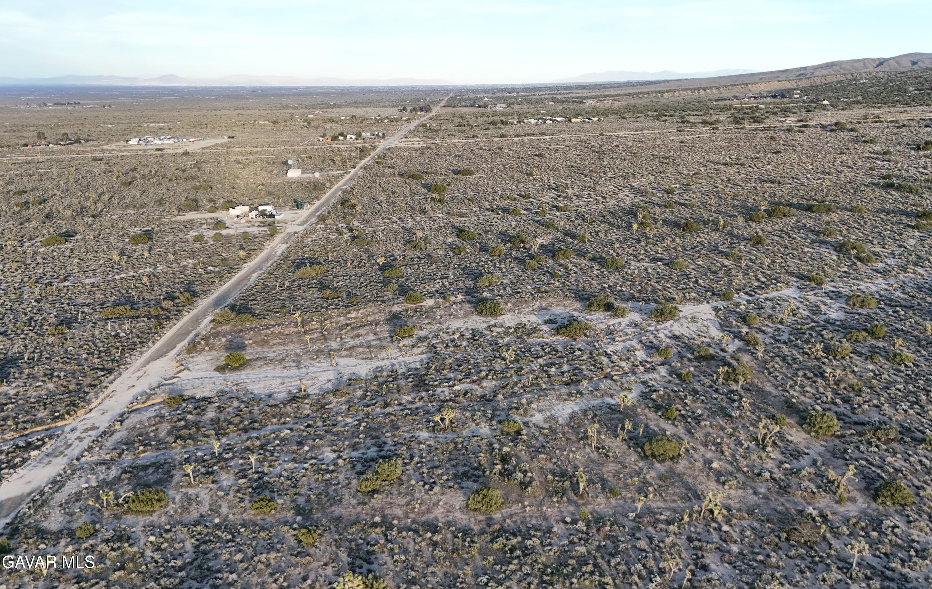 Ft Tejon Road Llano, CA 93544 - Photo 6 of 10 an aerial view of residential houses with outdoor space
