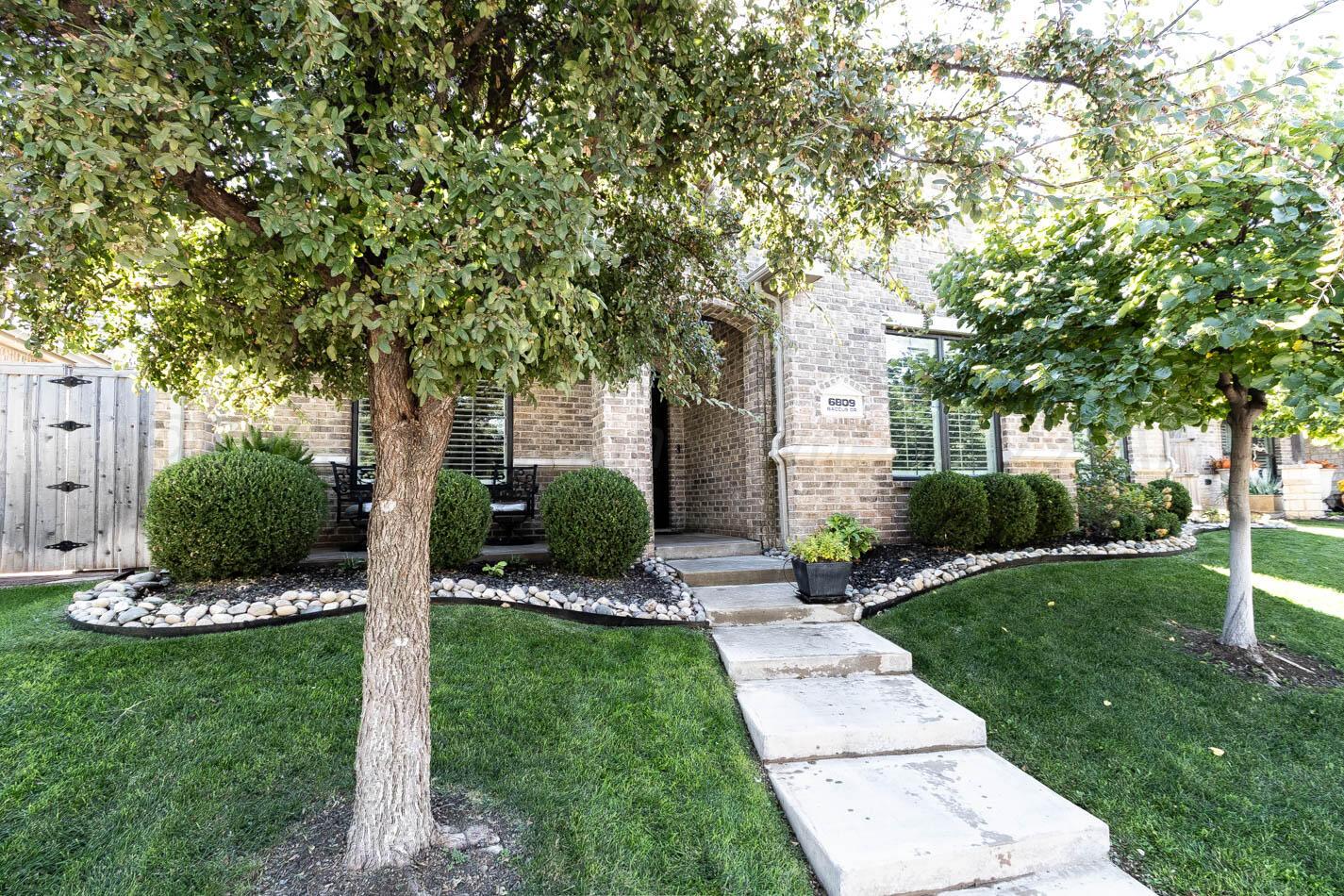 6809 Baccus Amarillo, TX 79124 - Photo 7 of 20 a view of a house with a back yard