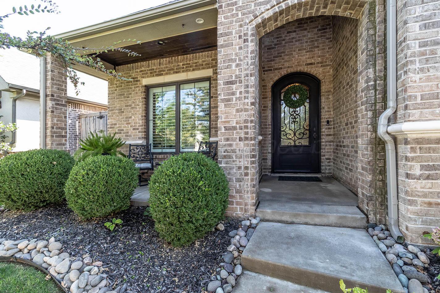 6809 Baccus Amarillo, TX 79124 - Photo 8 of 20 a front view of a house with garden