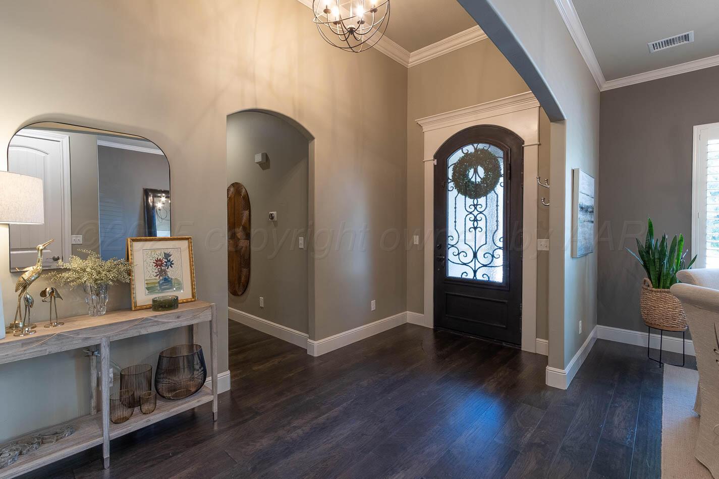 6809 Baccus Amarillo, TX 79124 - Photo 9 of 20 a view of hall way with furniture and hardwood floor