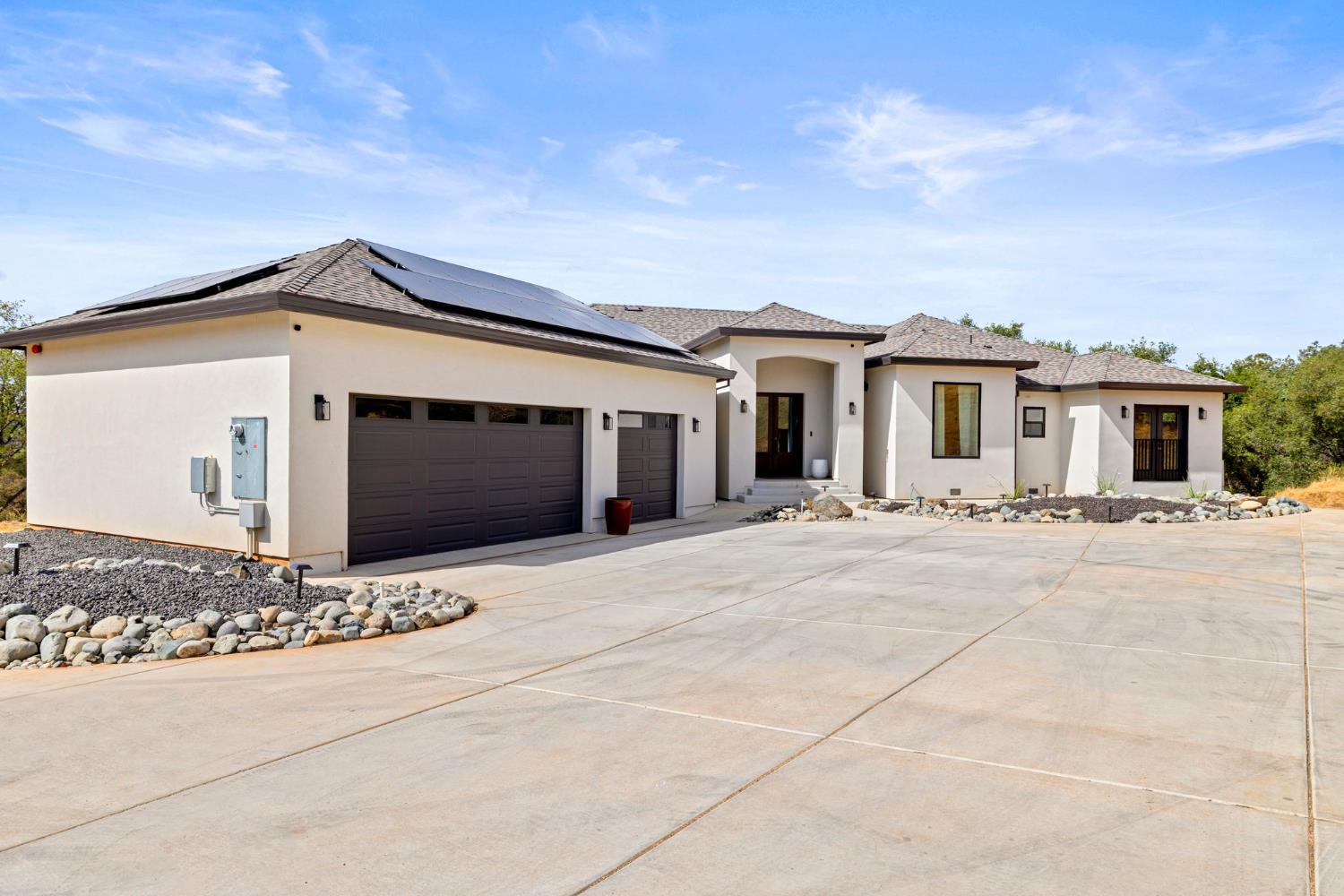 300 Dutch Ravine Lane Newcastle, CA 95658 - Photo 1 of 1 a front view of a house with a yard