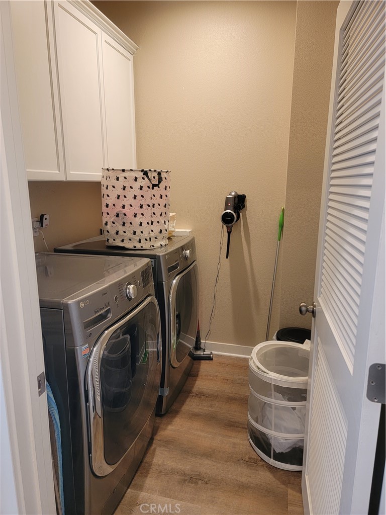 8014 Ackerman Street Buena Park, CA 90621 - Photo 5 of 16 a utility room with dryer and washer