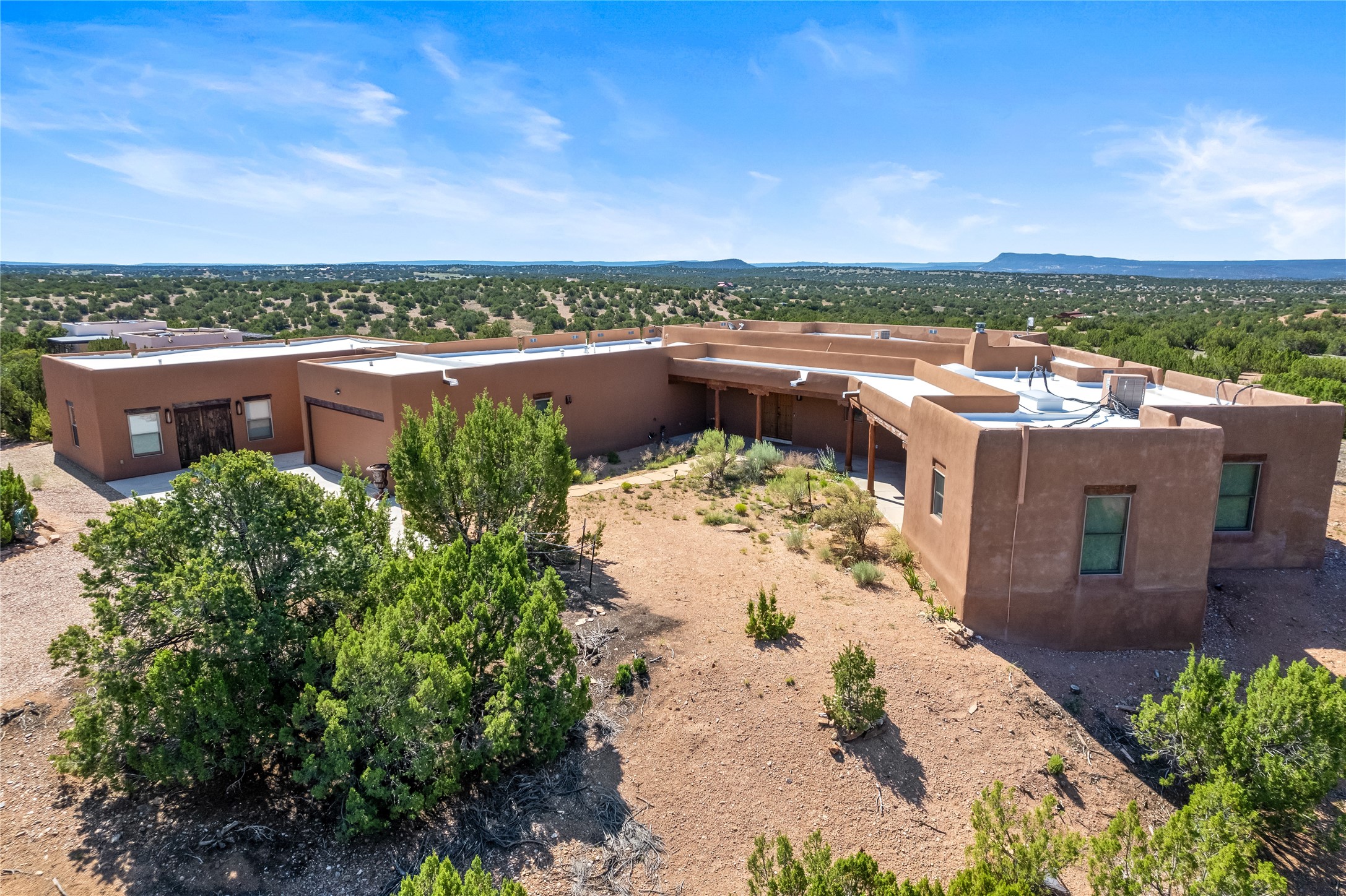 54 Don Jose Loop Santa Fe, NM 87508 - Photo 1 of 1 AERIAL SHOT OF THE ENTIRE HOUSE