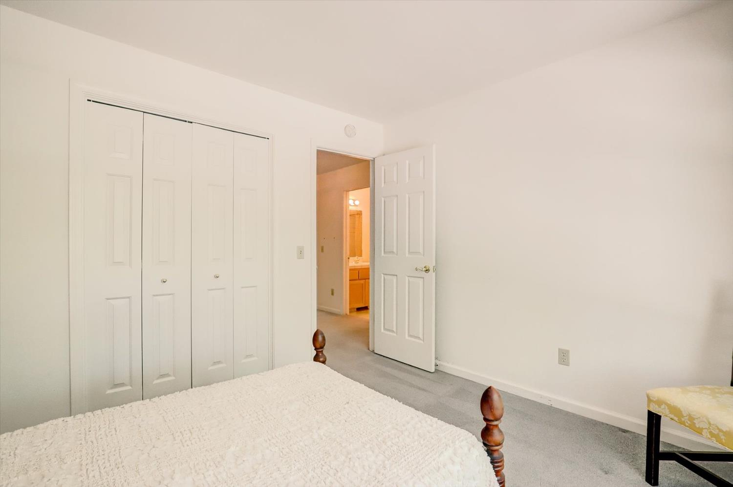 16479 Brewer Road Grass Valley, CA 95949 - Photo 13 of 33 a bedroom with a bed and a closet