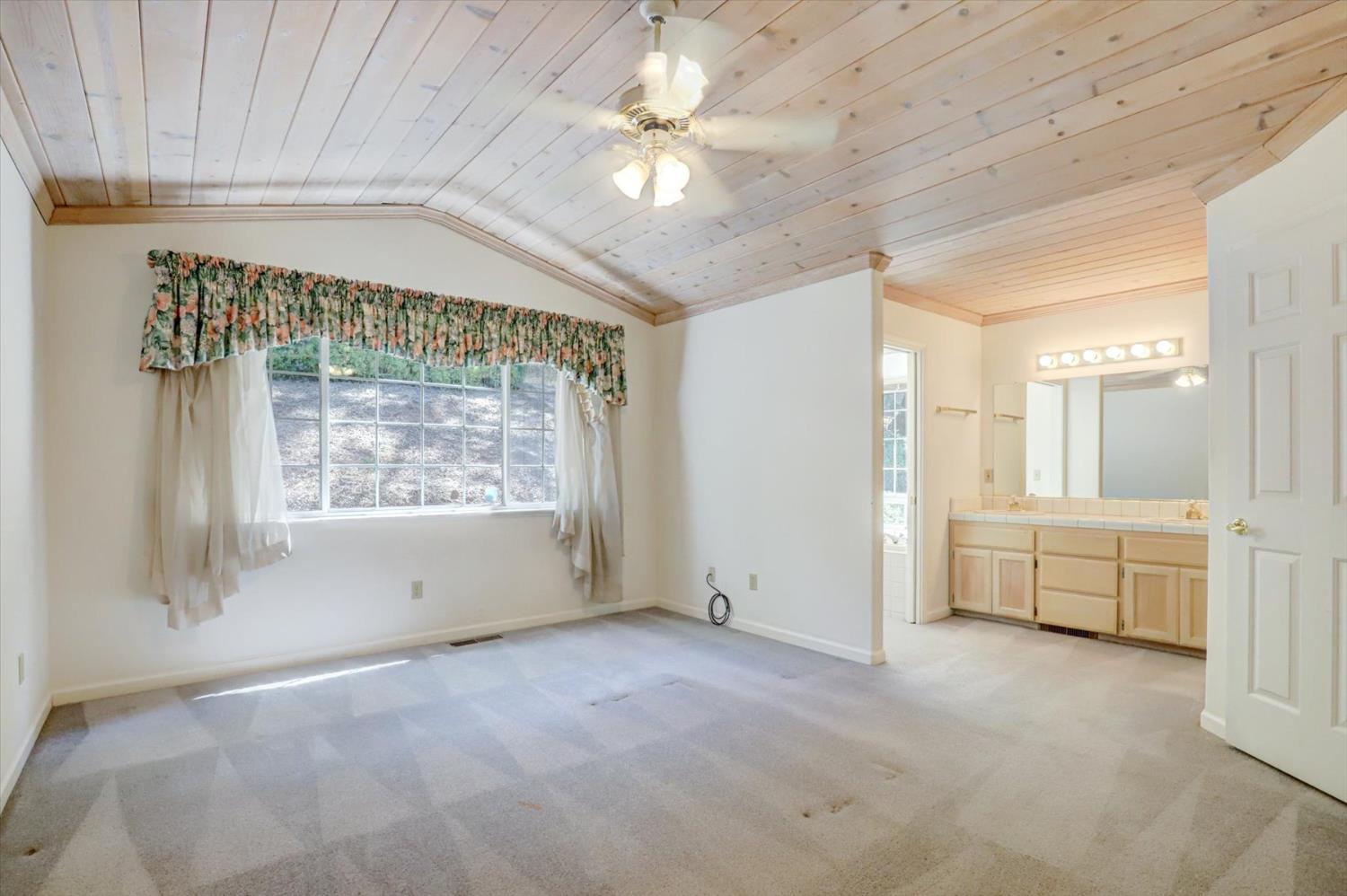 16479 Brewer Road Grass Valley, CA 95949 - Photo 17 of 33 a view of an empty room with a window