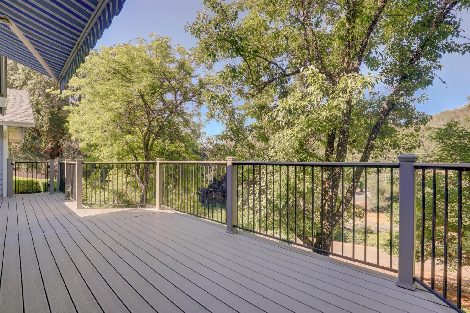 16479 Brewer Road Grass Valley, CA 95949 - Photo 23 of 33 a view of a balcony with wooden floor and fence