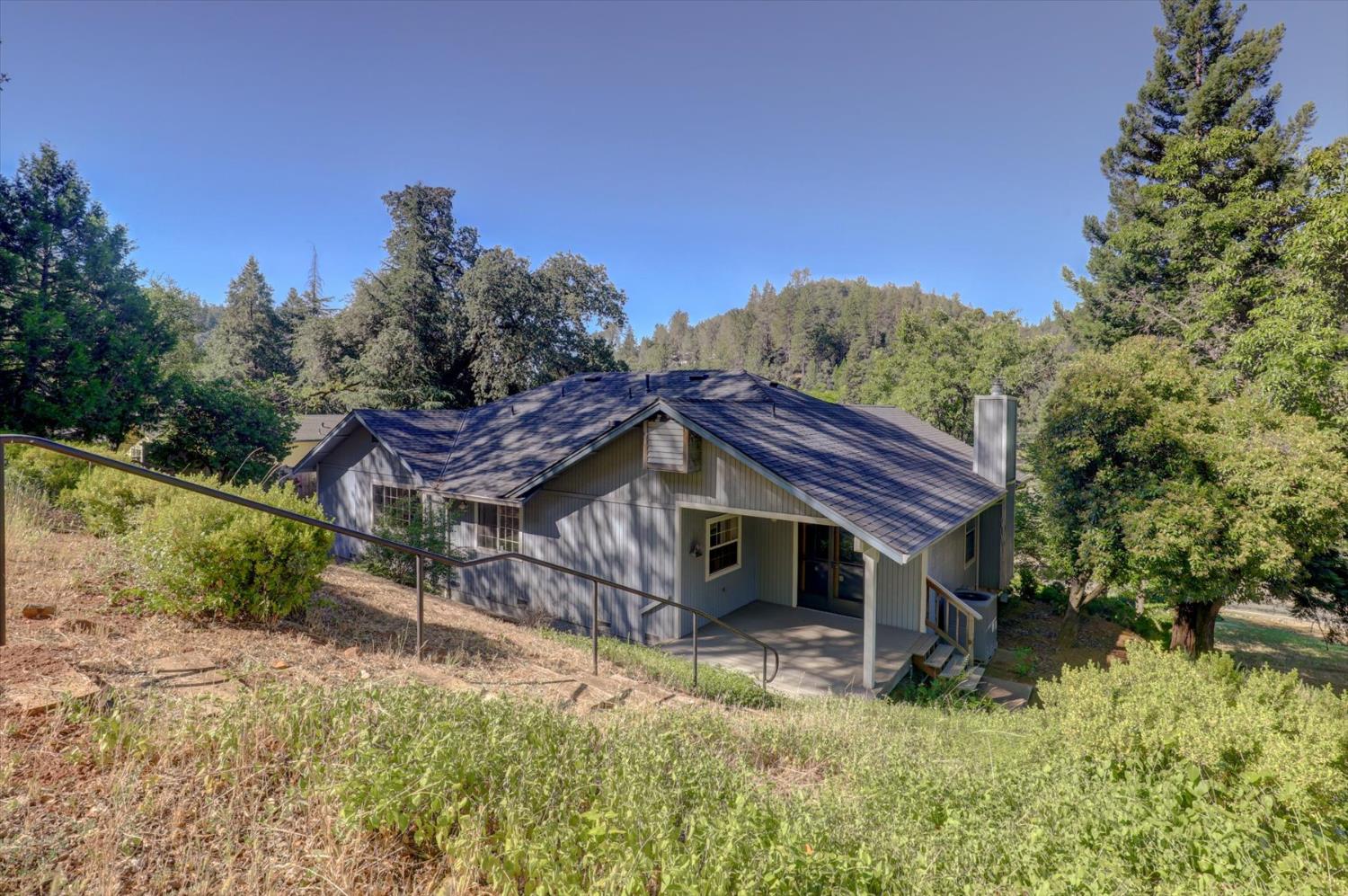 16479 Brewer Road Grass Valley, CA 95949 - Photo 26 of 33 a view of a house with a yard
