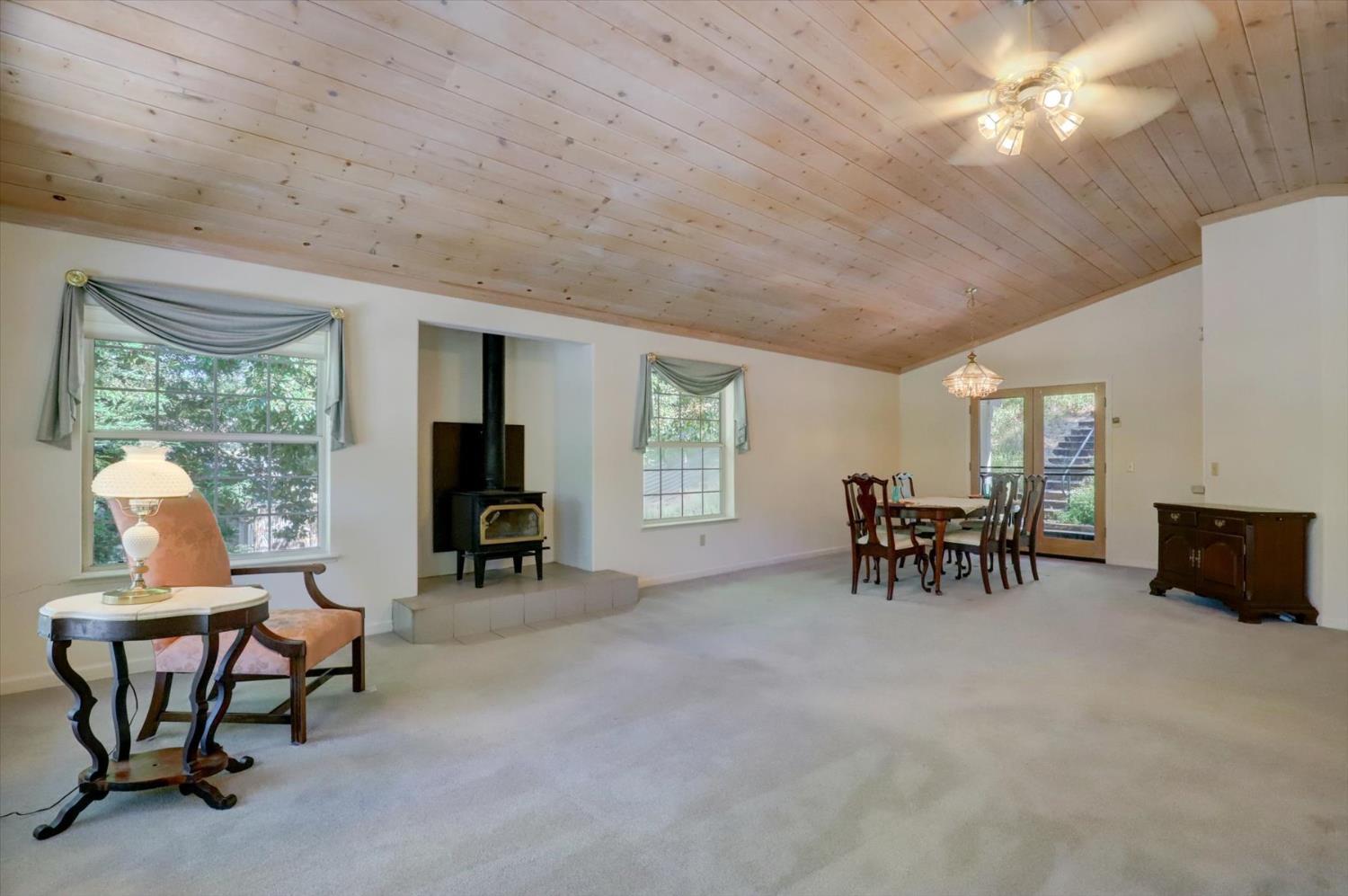 16479 Brewer Road Grass Valley, CA 95949 - Photo 3 of 33 a view of a livingroom with furniture and a flat screen tv