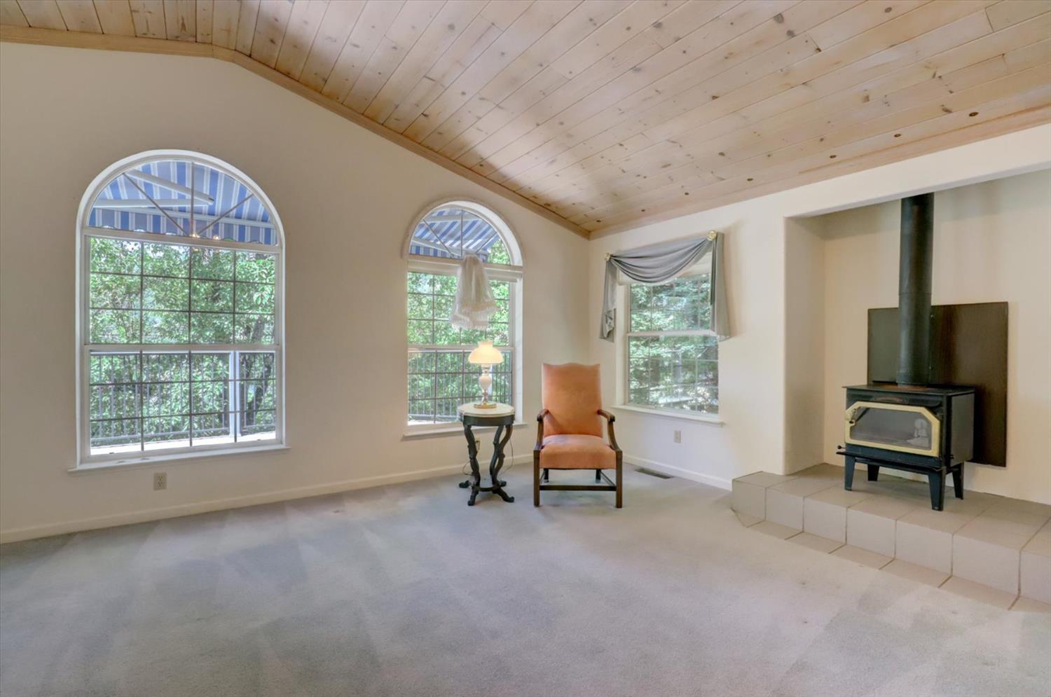 16479 Brewer Road Grass Valley, CA 95949 - Photo 4 of 33 a living room with furniture and a large window