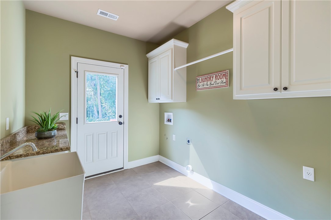 150 Osborne Road Townville, SC 29689 - Photo 20 of 50 Awesome laundry room! Folding station, hanging rac