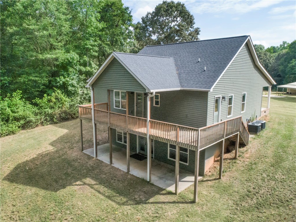 150 Osborne Road Townville, SC 29689 - Photo 3 of 50 Rear angled view showing wrap deck