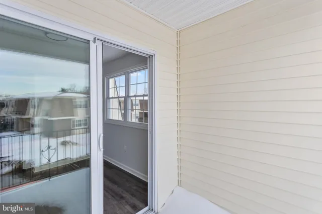 a bathroom with a glass door