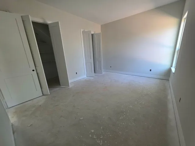 an empty room with windows