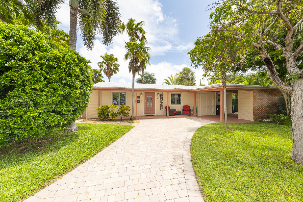 14 Bamboo Terrace Key Haven, FL 33040 - Photo 1 of 32 front view of a house with a yard
