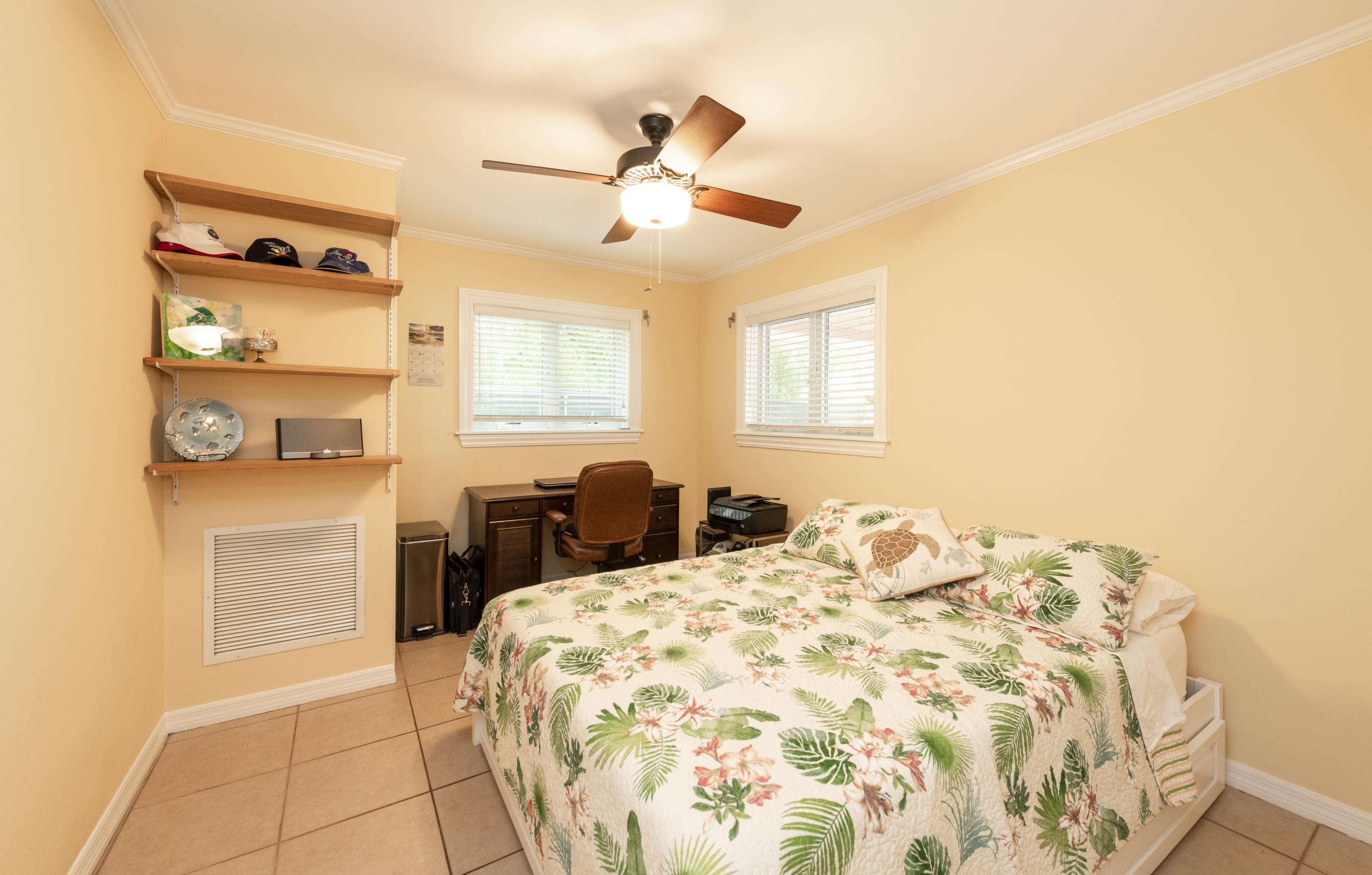 14 Bamboo Terrace Key Haven, FL 33040 - Photo 17 of 32 a bedroom with a bed and a closet