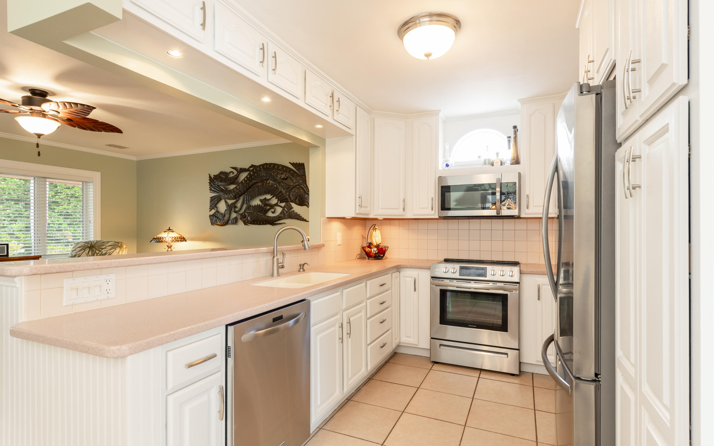 14 Bamboo Terrace Key Haven, FL 33040 - Photo 20 of 32 a kitchen with a sink cabinets and appliances