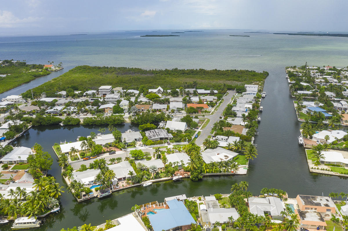 14 Bamboo Terrace Key Haven, FL 33040 - Photo 24 of 32 a view of a lake with a mountain in the background