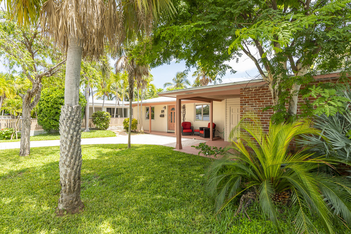 14 Bamboo Terrace Key Haven, FL 33040 - Photo 25 of 32 a view of a house with backyard and sitting area
