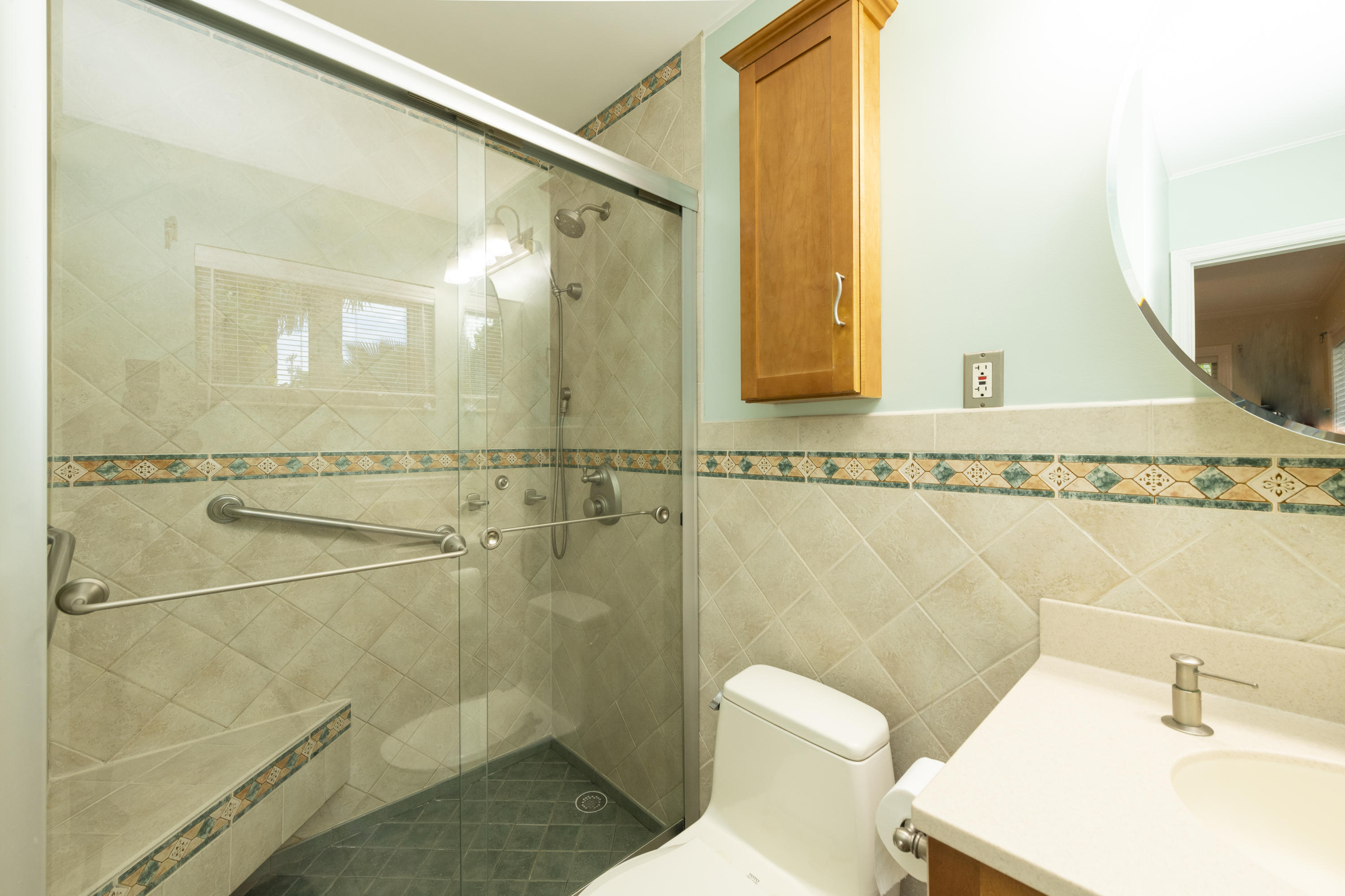 14 Bamboo Terrace Key Haven, FL 33040 - Photo 30 of 32 a bathroom with a sink a toilet and shower