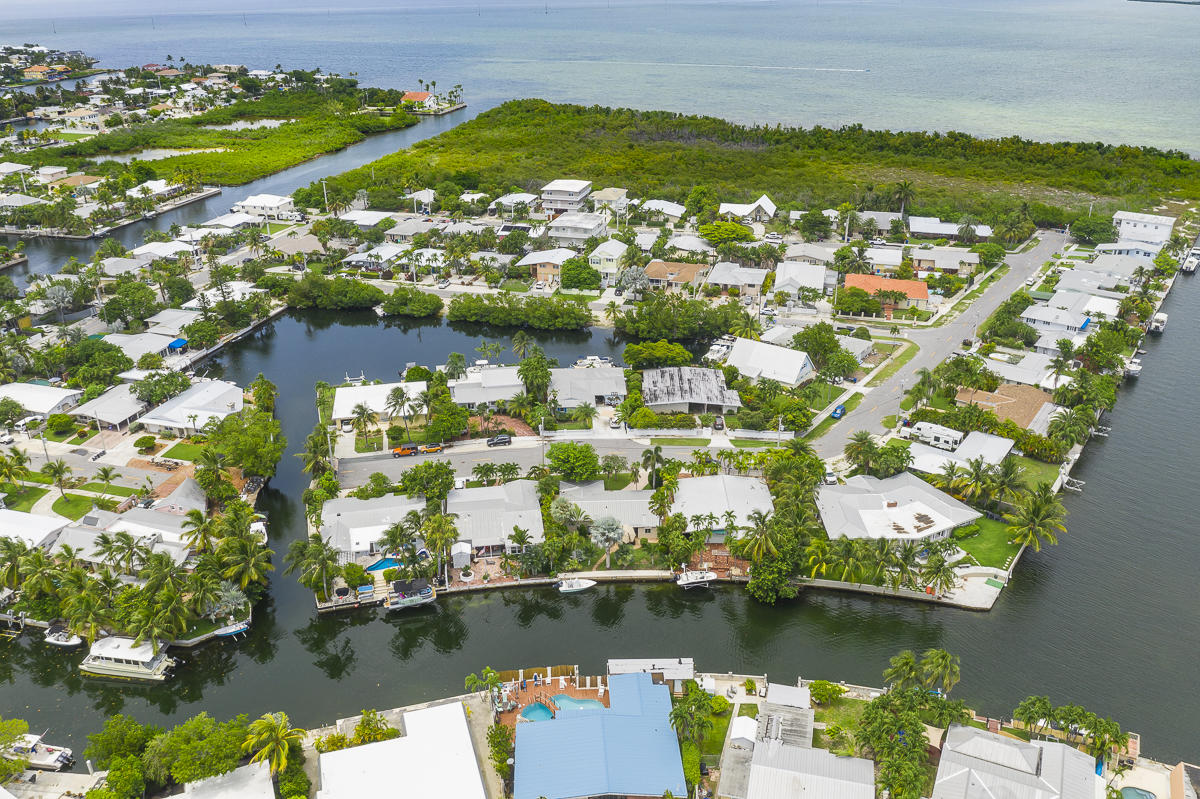 14 Bamboo Terrace Key Haven, FL 33040 - Photo 3 of 32 an aerial view of residential houses with outdoor space and lake view