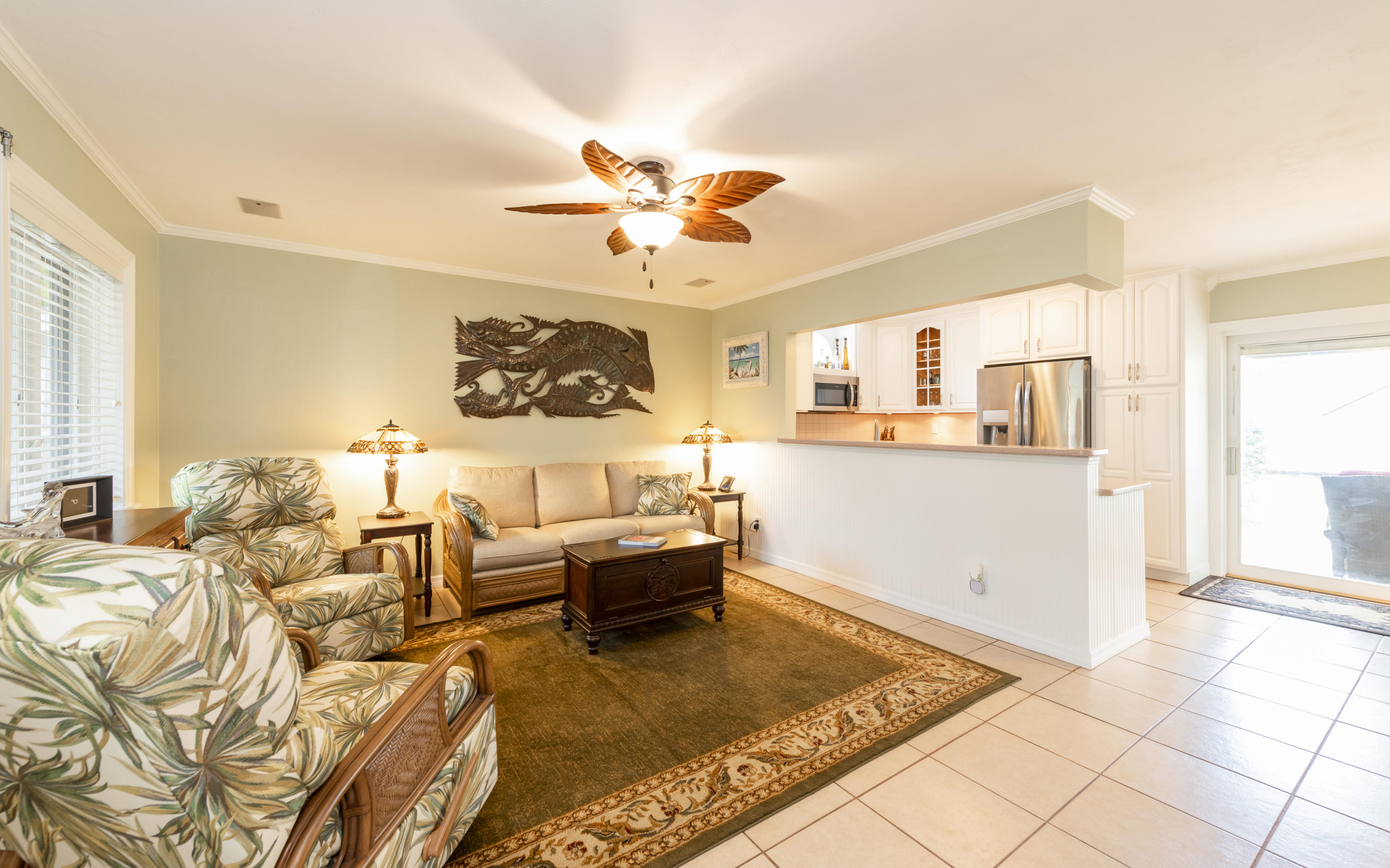 14 Bamboo Terrace Key Haven, FL 33040 - Photo 5 of 32 a living room with fireplace furniture and a large window