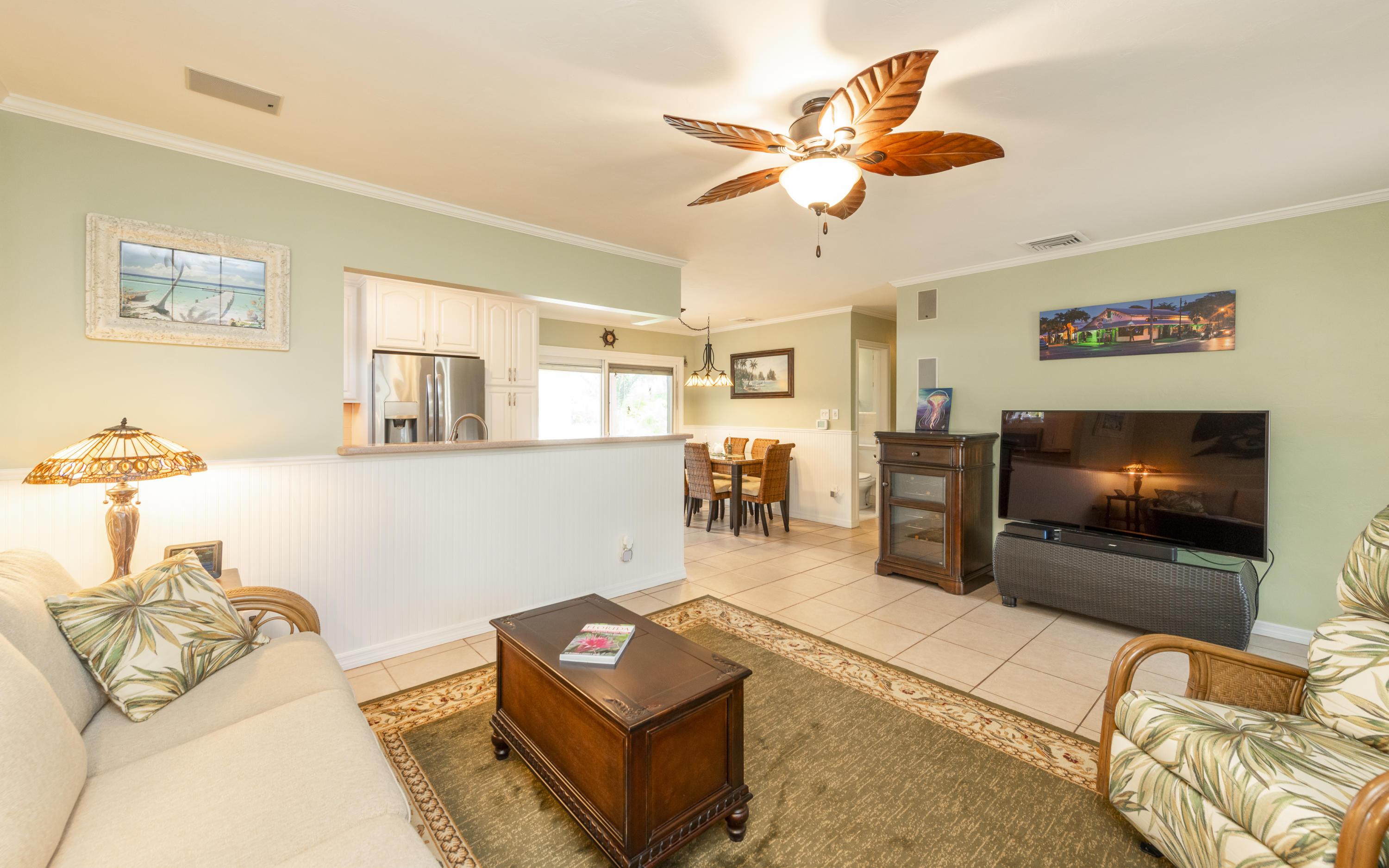 14 Bamboo Terrace Key Haven, FL 33040 - Photo 6 of 32 a living room with furniture and a flat screen tv