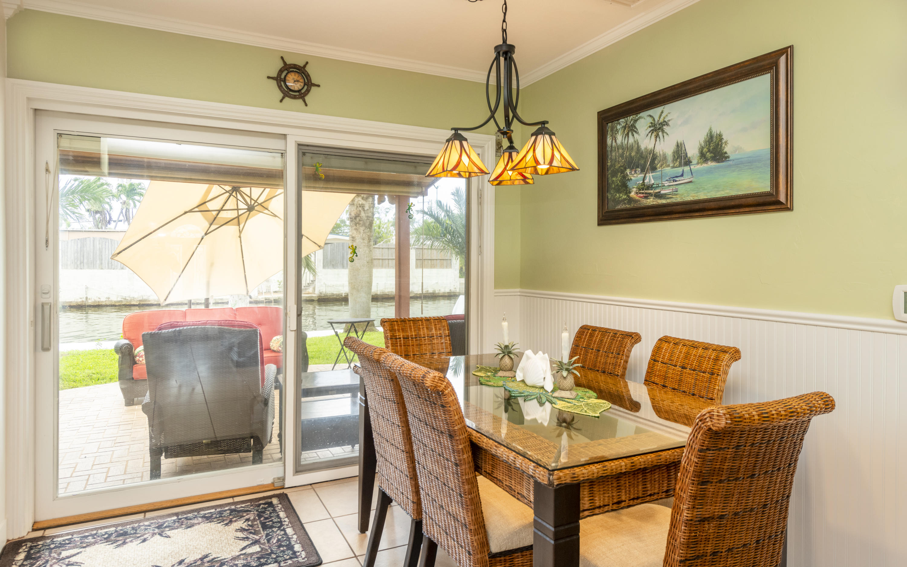 14 Bamboo Terrace Key Haven, FL 33040 - Photo 7 of 32 a dining room with furniture and a window