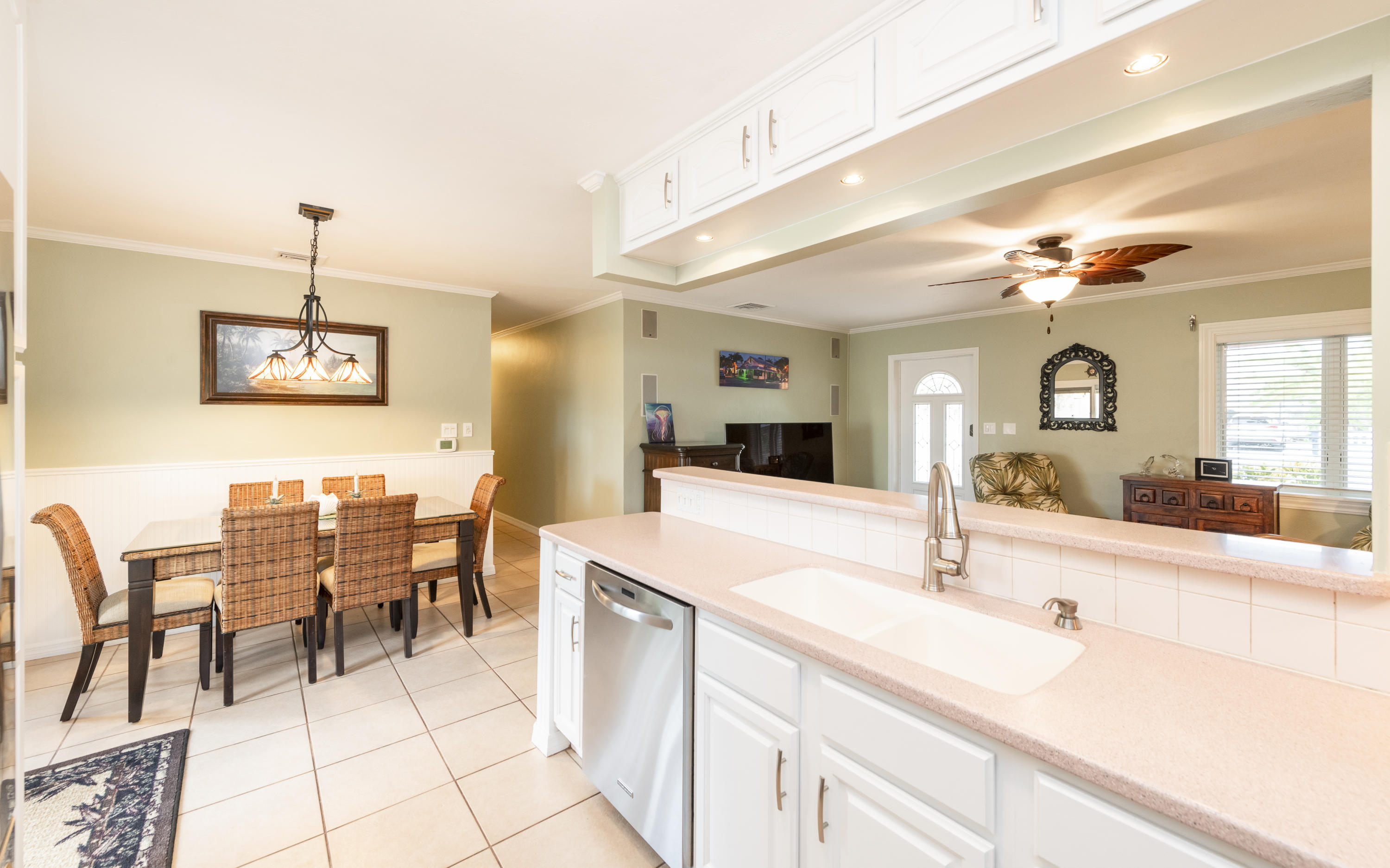 14 Bamboo Terrace Key Haven, FL 33040 - Photo 9 of 32 a large kitchen with a table and chairs