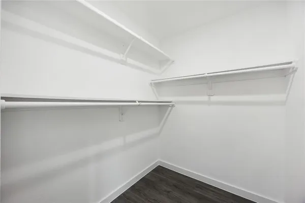 a view of an empty walk in closet