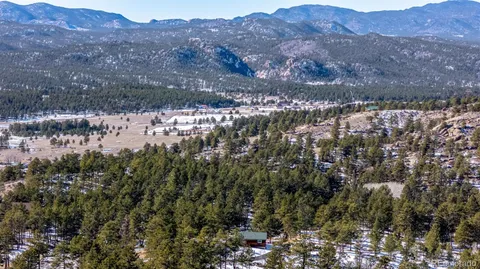 a view of a city and mountains