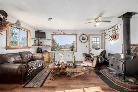 a living room with furniture or couch and a window