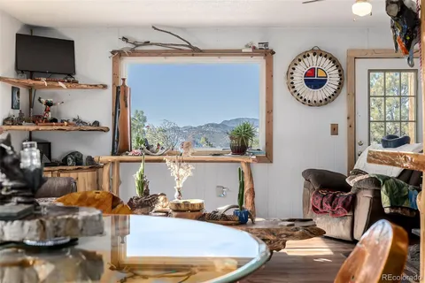 a room with furniture and a flat screen tv