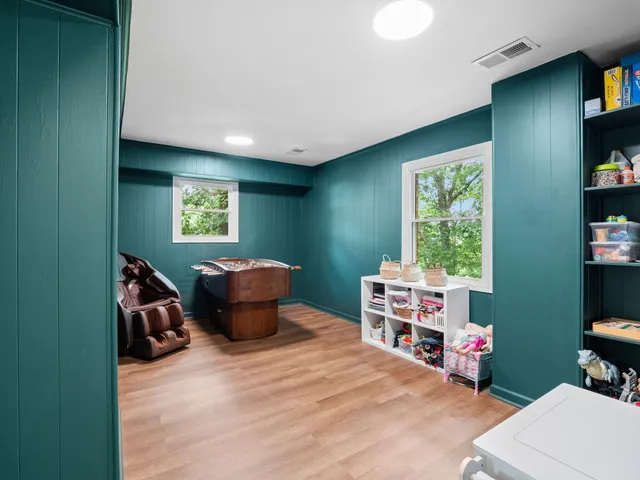 a room with furniture and a window