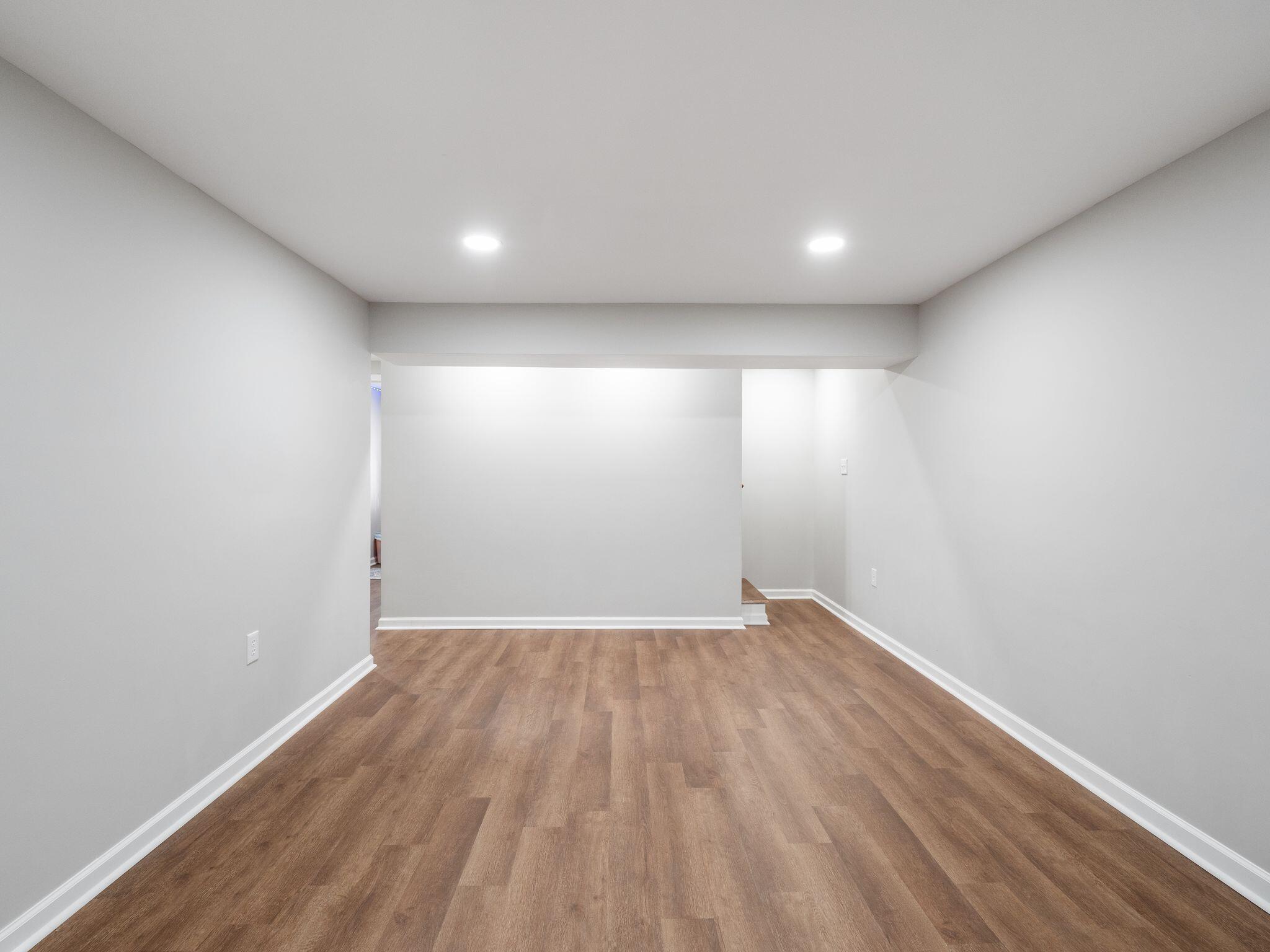 1701 Glendon Road Salem, VA 24153 - Photo 37 of 43 an empty room with wooden floor and windows