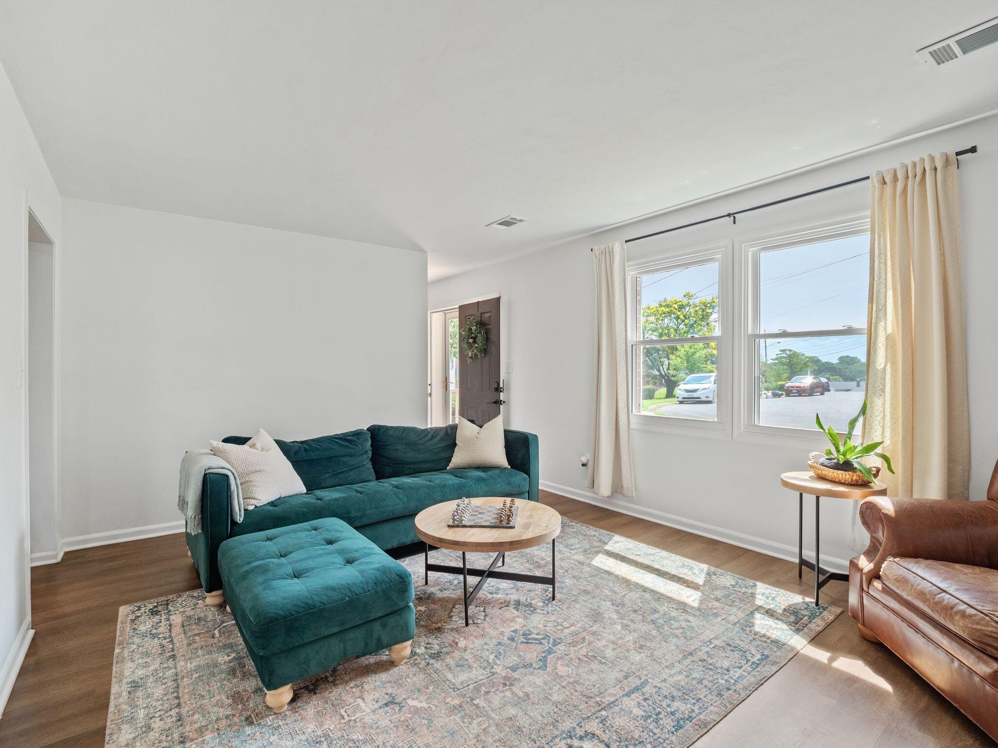 1701 Glendon Road Salem, VA 24153 - Photo 6 of 43 a living room with furniture and a window