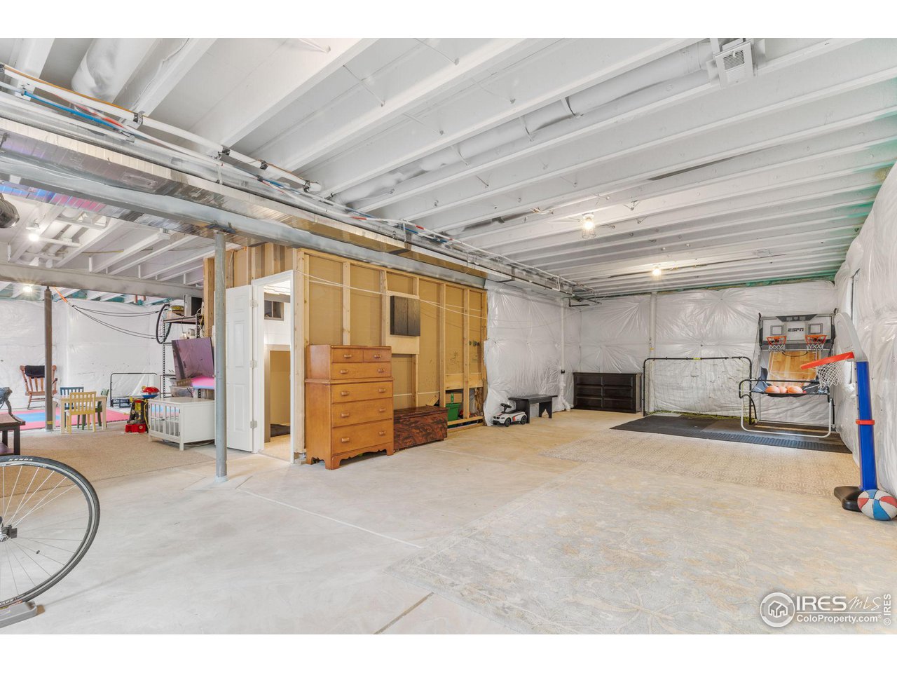 803 Old Wagon Trail Circle Lafayette, CO 80026 - Photo 21 of 30 a view of a room with gym equipment